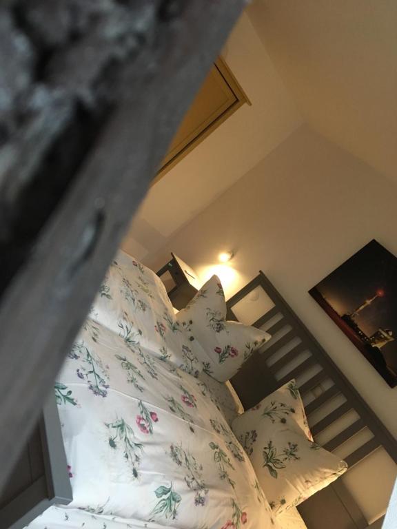 Postel nebo postele na pokoji v ubytování Ferienhaus Harzinsel
