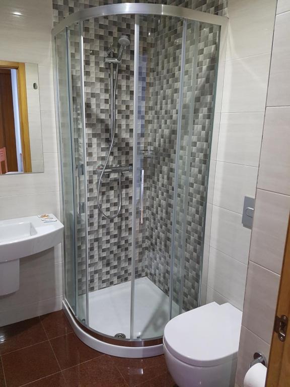 Kúpeľňa v ubytovaní HOSTAL CAMELOT