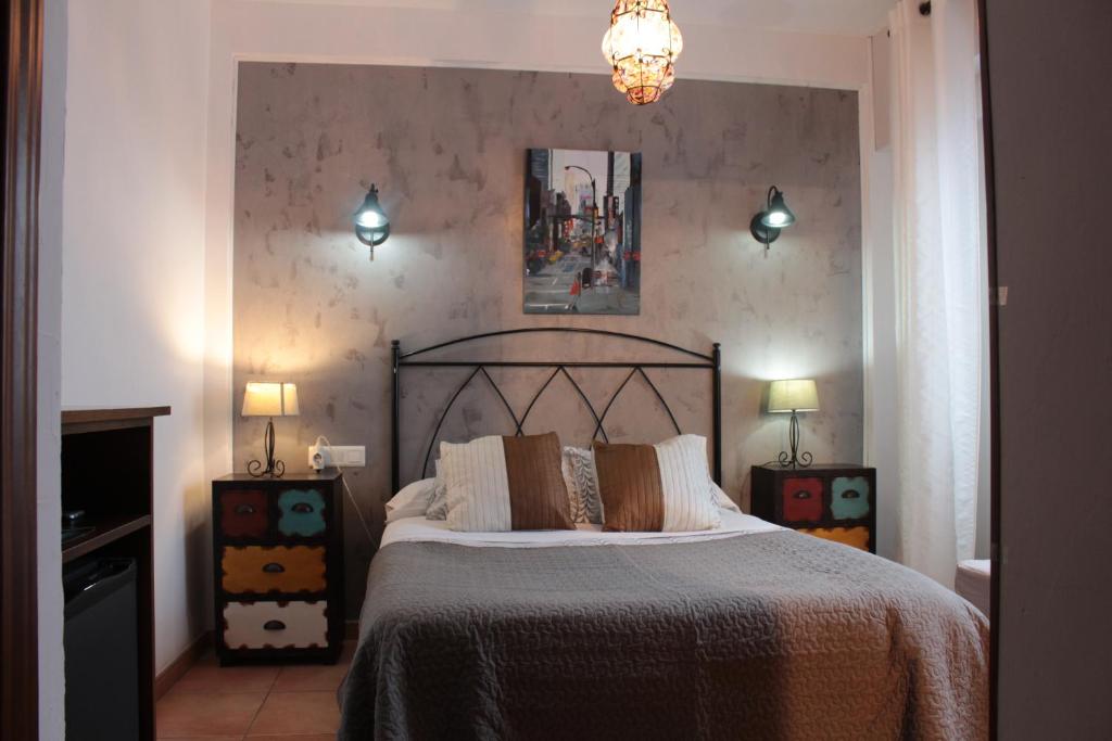 Postel nebo postele na pokoji v ubytování Hostal Don Peque Adult Recommended