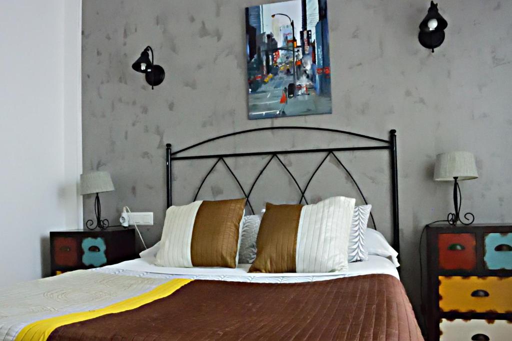 Postel nebo postele na pokoji v ubytování Hostal Don Peque Adult Recommended