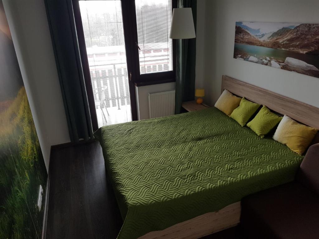 Posteľ alebo postele v izbe v ubytovaní Apartmán pod Štítom
