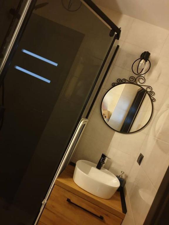 Kúpeľňa v ubytovaní VISTULA two-bedroom Apartment