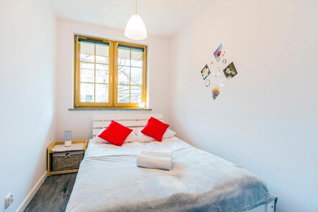 Posteľ alebo postele v izbe v ubytovaní Apartamenty EverySky - Osiedle Podgórze 1D