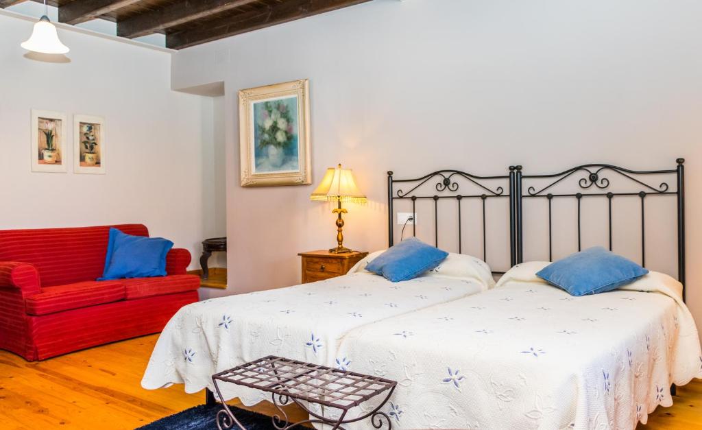 Postel nebo postele na pokoji v ubytování Casa de Aldea el Navaron