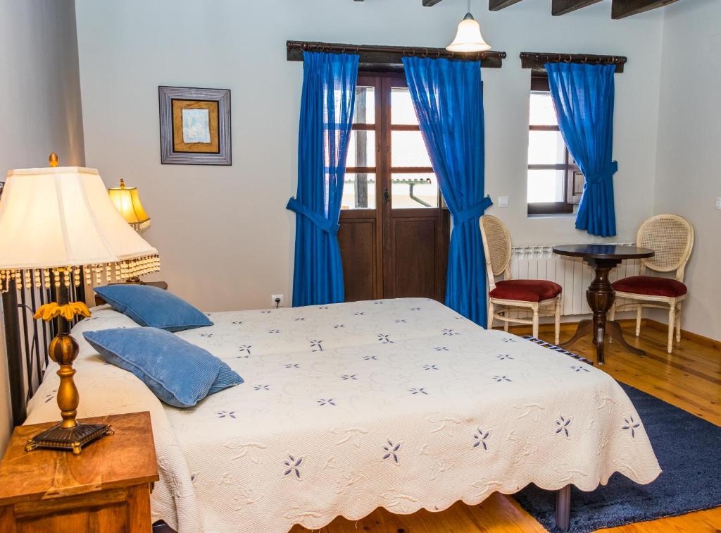 Postel nebo postele na pokoji v ubytování Casa de Aldea el Navaron