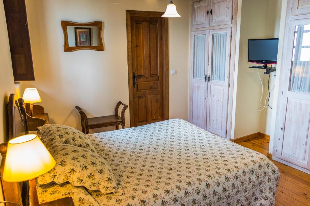 Postel nebo postele na pokoji v ubytování Casa de Aldea el Navaron