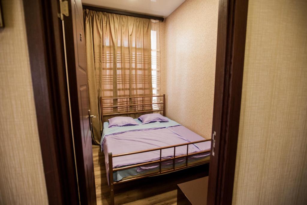Postel nebo postele na pokoji v ubytování Guest House Didis