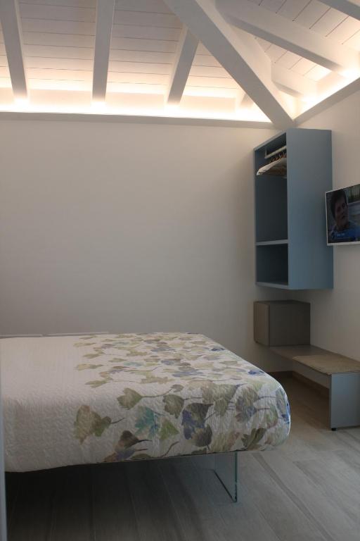 Postel nebo postele na pokoji v ubytování ARIA Design B&B Levanto