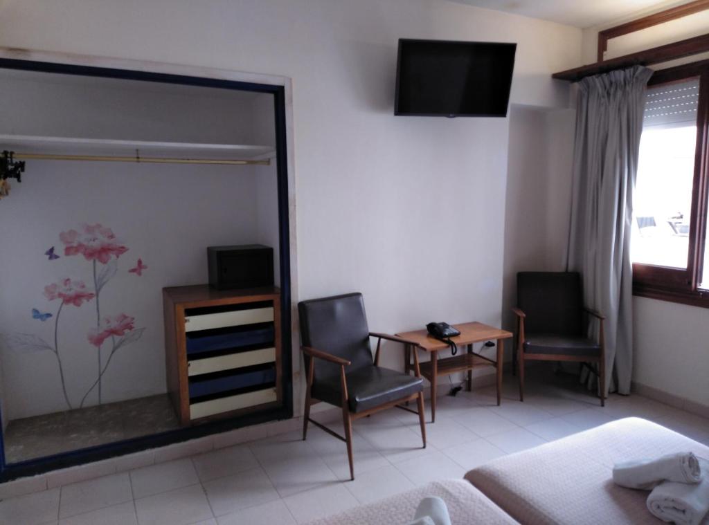 Postel nebo postele na pokoji v ubytování Hotel Corisco