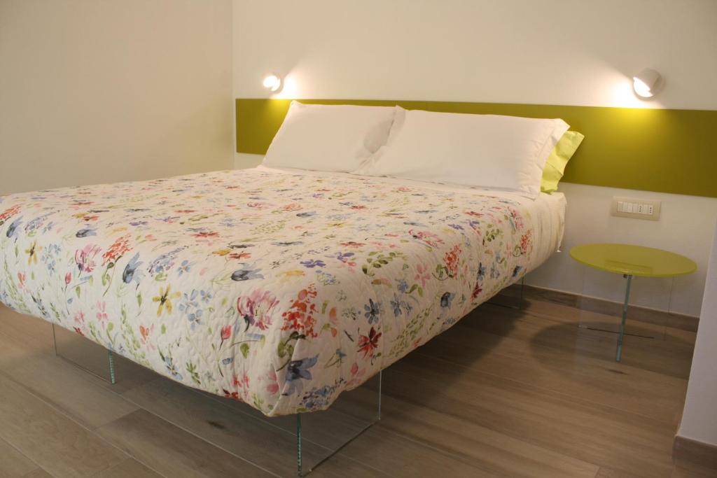 Postel nebo postele na pokoji v ubytování ARIA Design B&B Levanto