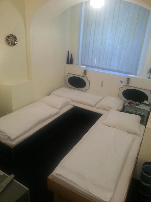 Hotelgarni Frankfurt - Driepersoonskamer
