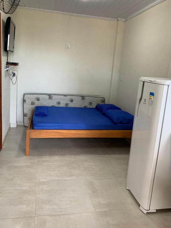Postel nebo postele na pokoji v ubytování Flats Alto das Pedras