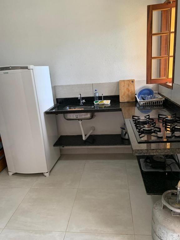 Kuchyň nebo kuchyňský kout v ubytování Flats Alto das Pedras