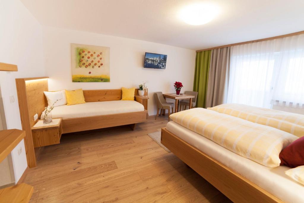Postel nebo postele na pokoji v ubytování B&B Landhaus Vierthaler