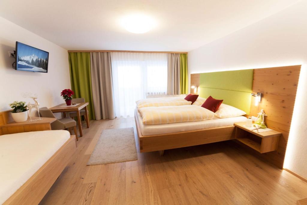Postel nebo postele na pokoji v ubytování B&B Landhaus Vierthaler