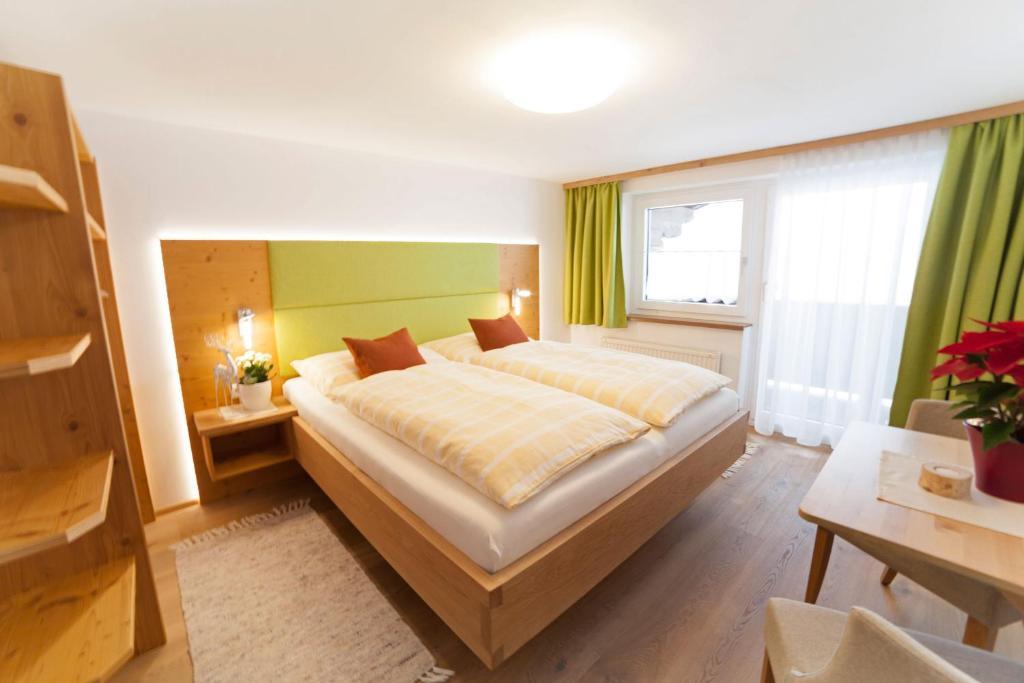 Postel nebo postele na pokoji v ubytování B&B Landhaus Vierthaler