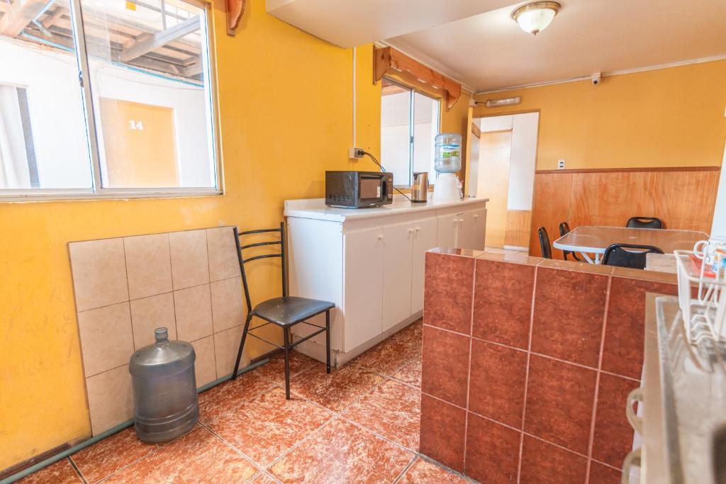 Köök või kööginurk majutusasutuses Hostal El Descanso