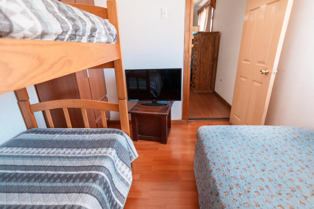 Voodi või voodid majutusasutuse Hostal El Descanso toas