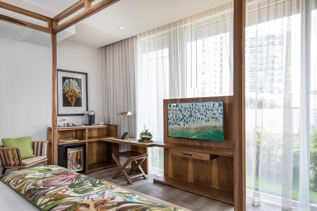 TV a/nebo společenská místnost v ubytování Lennox Miami Beach