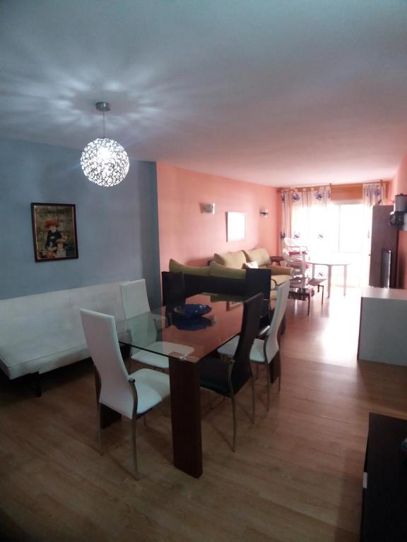 Posedenie v ubytovaní Bonito Apartamento con varias piscinas