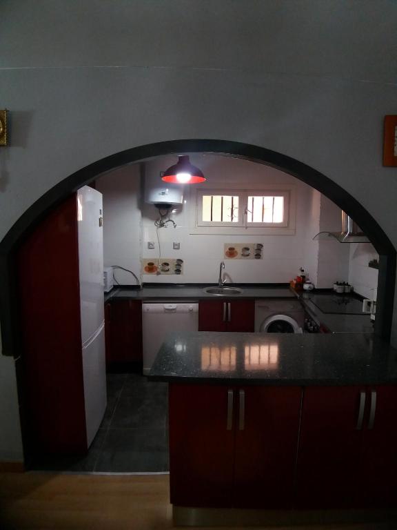Kuchyňa alebo kuchynka v ubytovaní Bonito Apartamento con varias piscinas