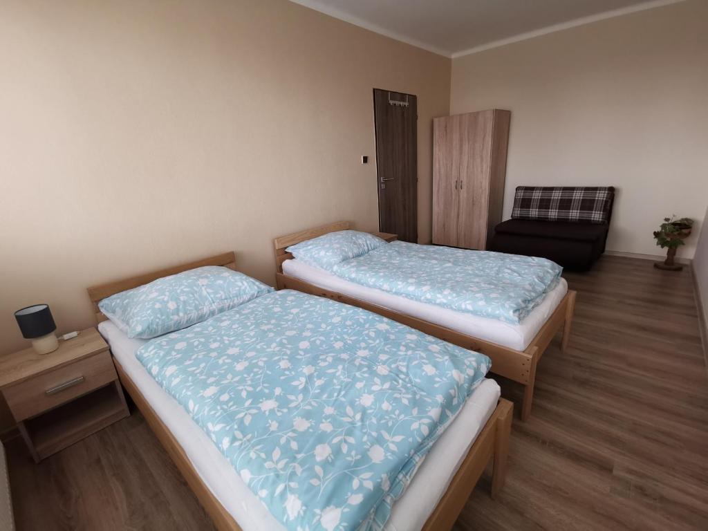 Postel nebo postele na pokoji v ubytování U Vrbů