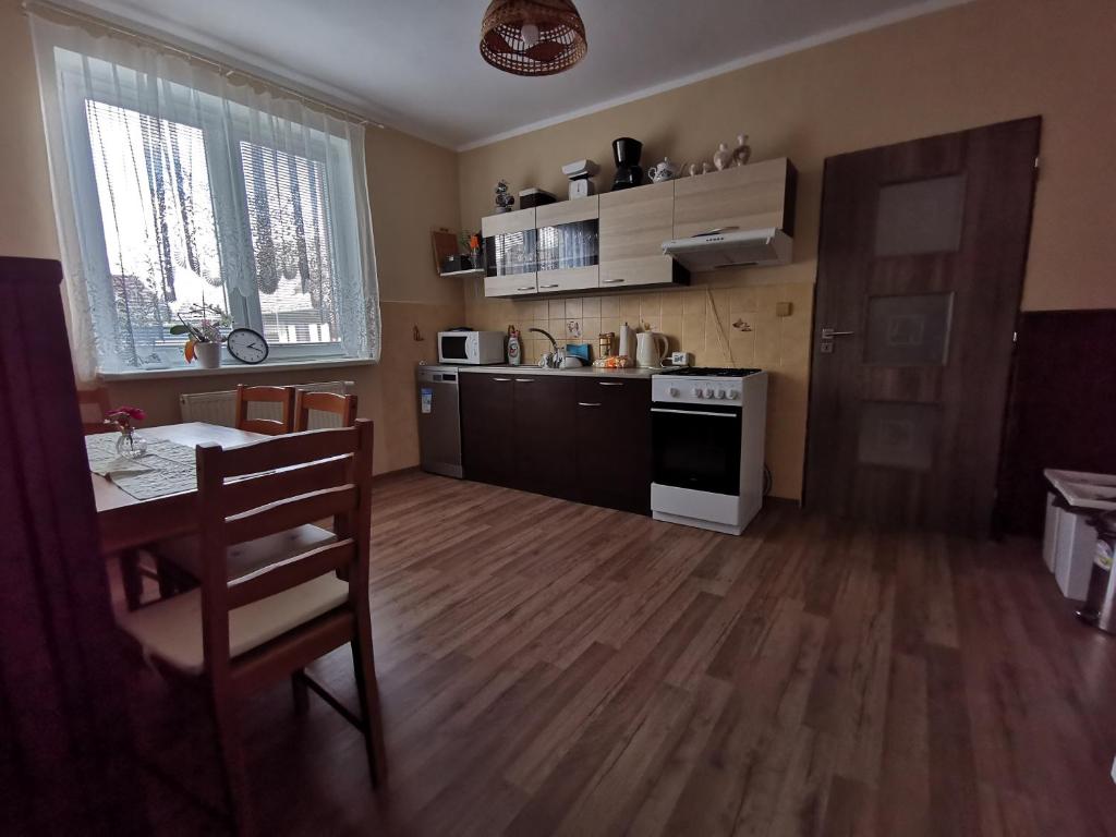 Kuchyň nebo kuchyňský kout v ubytování U Vrbů