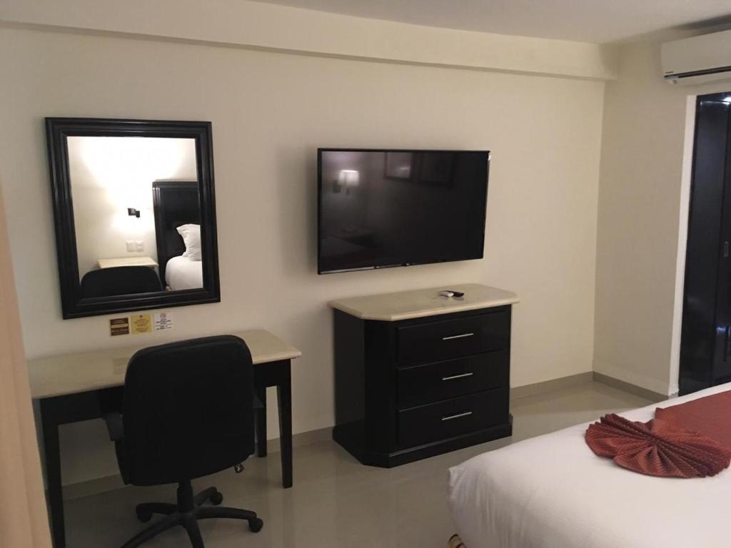 TV a/nebo společenská místnost v ubytování Hotel Lopez Campeche