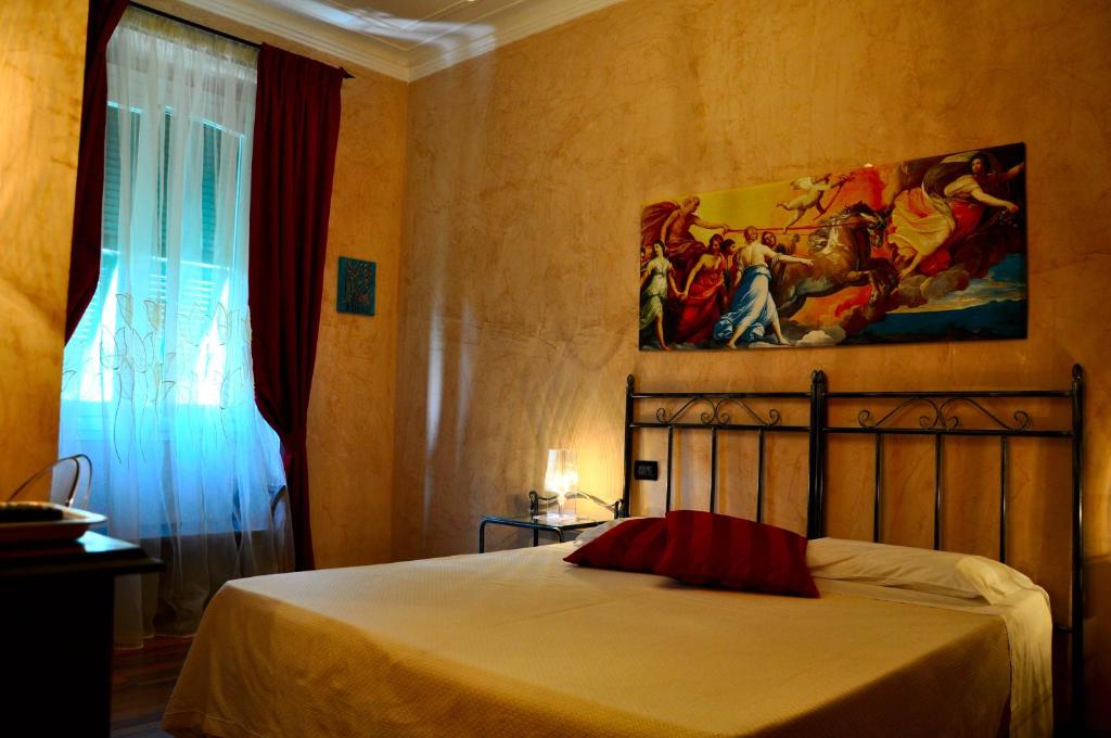Ein Bett oder Betten in einem Zimmer der Unterkunft Locanda Villa Moderna