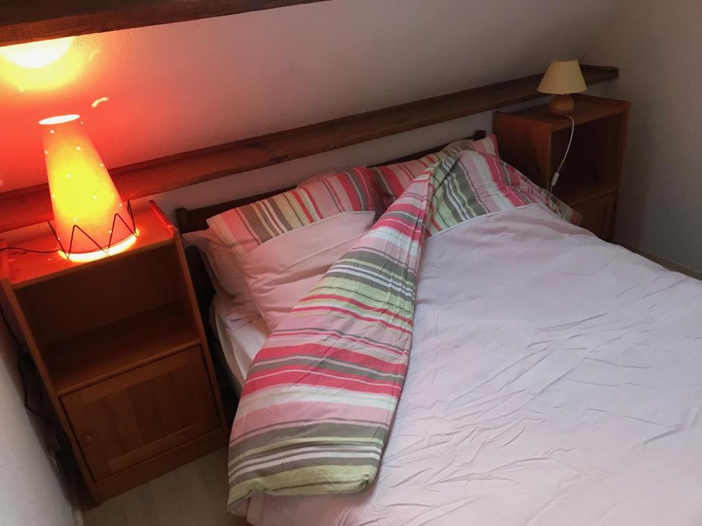 Postel nebo postele na pokoji v ubytování Normandia
