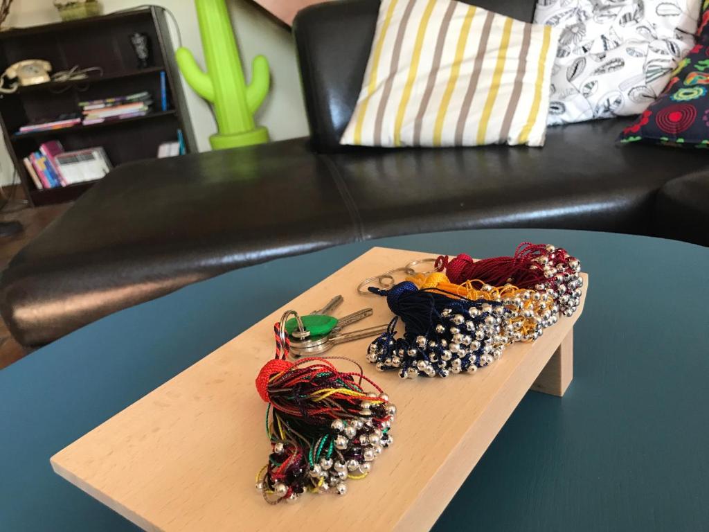 a coffee table withjeweled objects on top of it at Normandia in Nonant