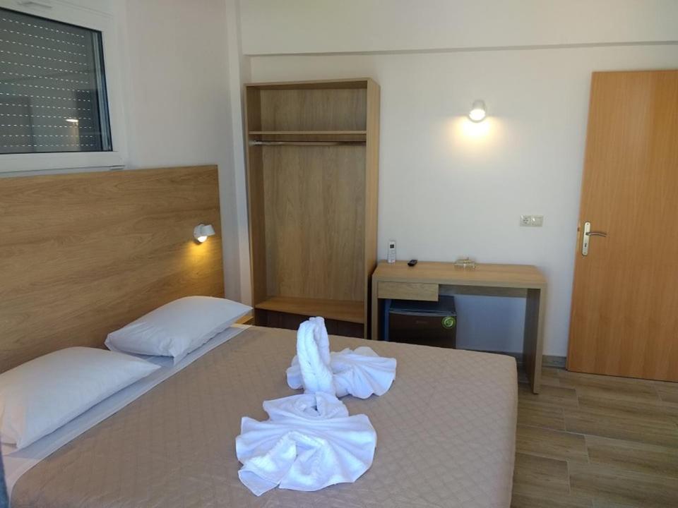 Postel nebo postele na pokoji v ubytování International Hotel