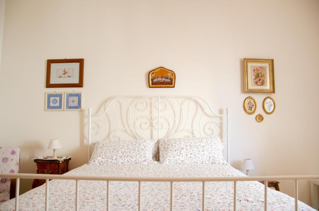 Postel nebo postele na pokoji v ubytování Casa Gentile Carducci