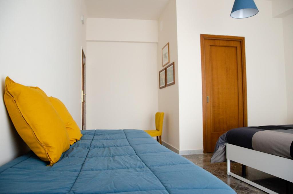Postel nebo postele na pokoji v ubytování Casa Gentile Carducci