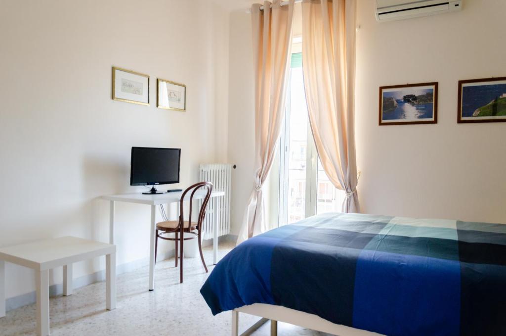 TV a/nebo společenská místnost v ubytování Casa Gentile Carducci