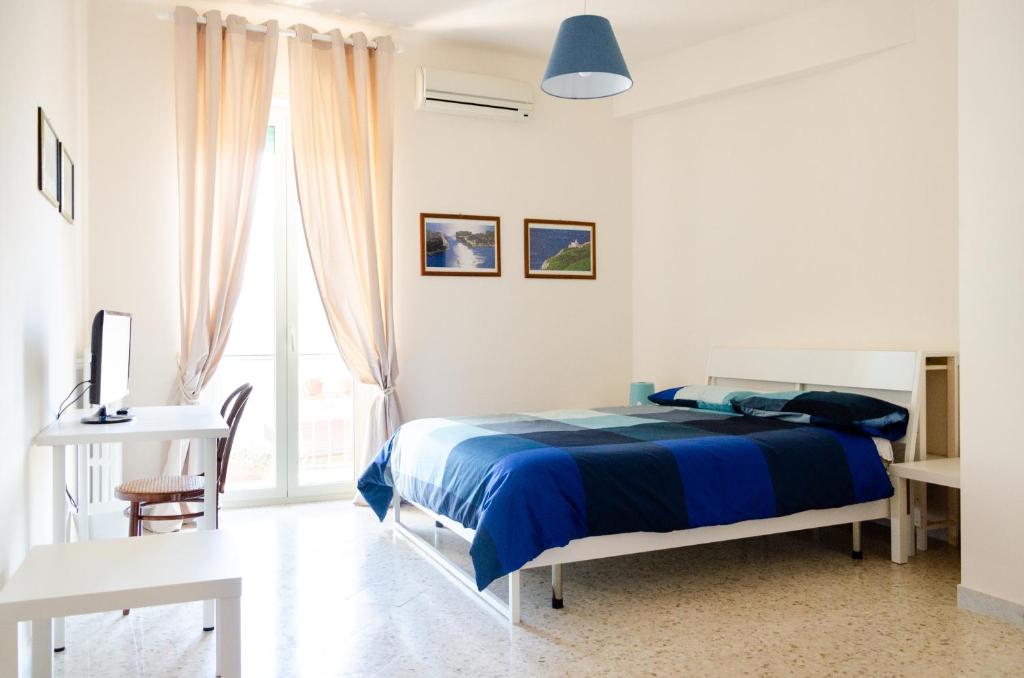 Postel nebo postele na pokoji v ubytování Casa Gentile Carducci