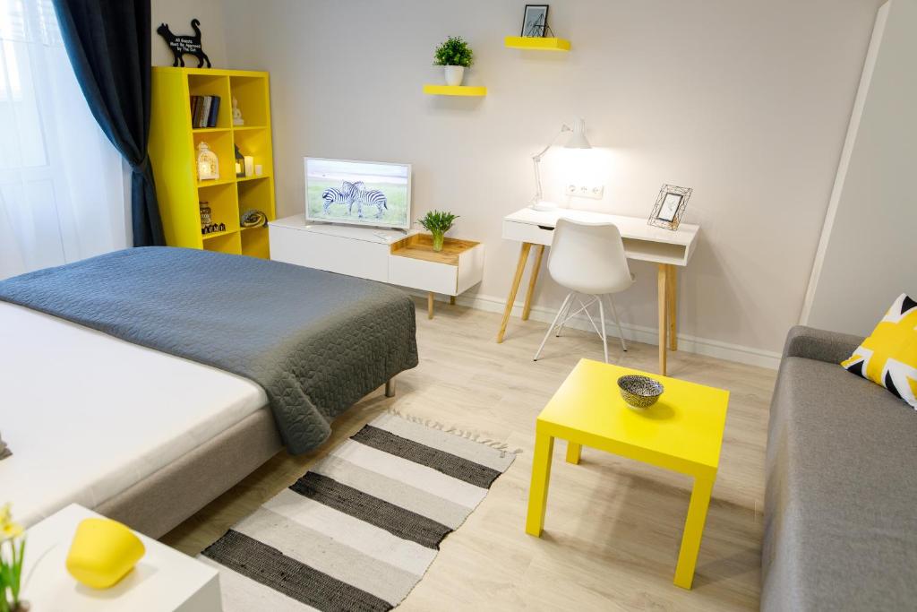 Postel nebo postele na pokoji v ubytování Apart-Hotel "LAVINA"
