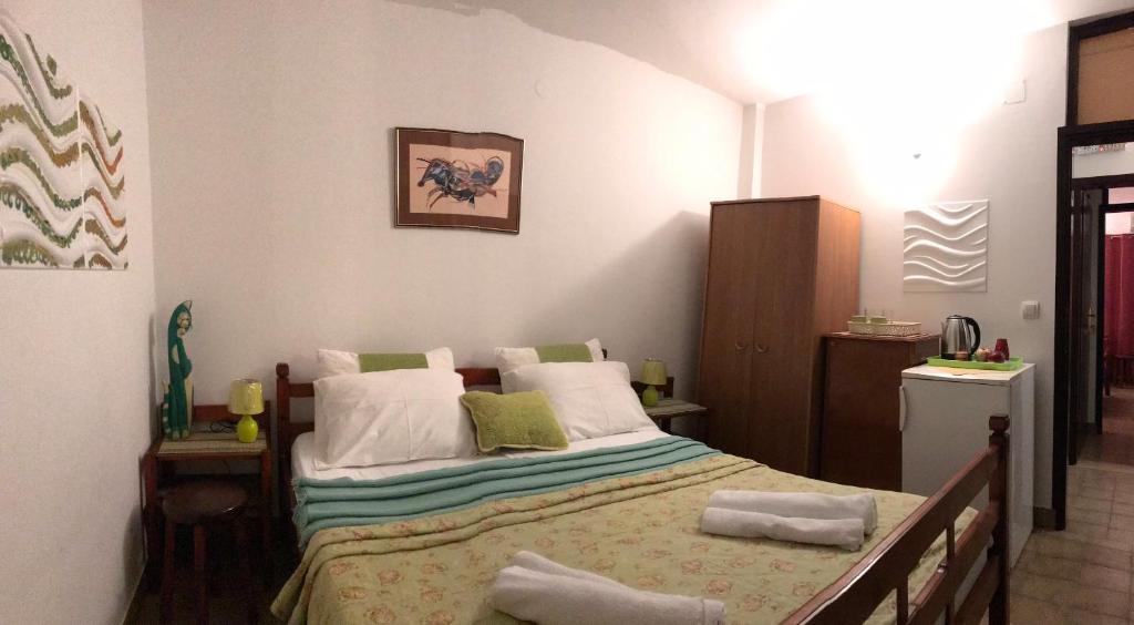 Postel nebo postele na pokoji v ubytování Miron apart&rooms