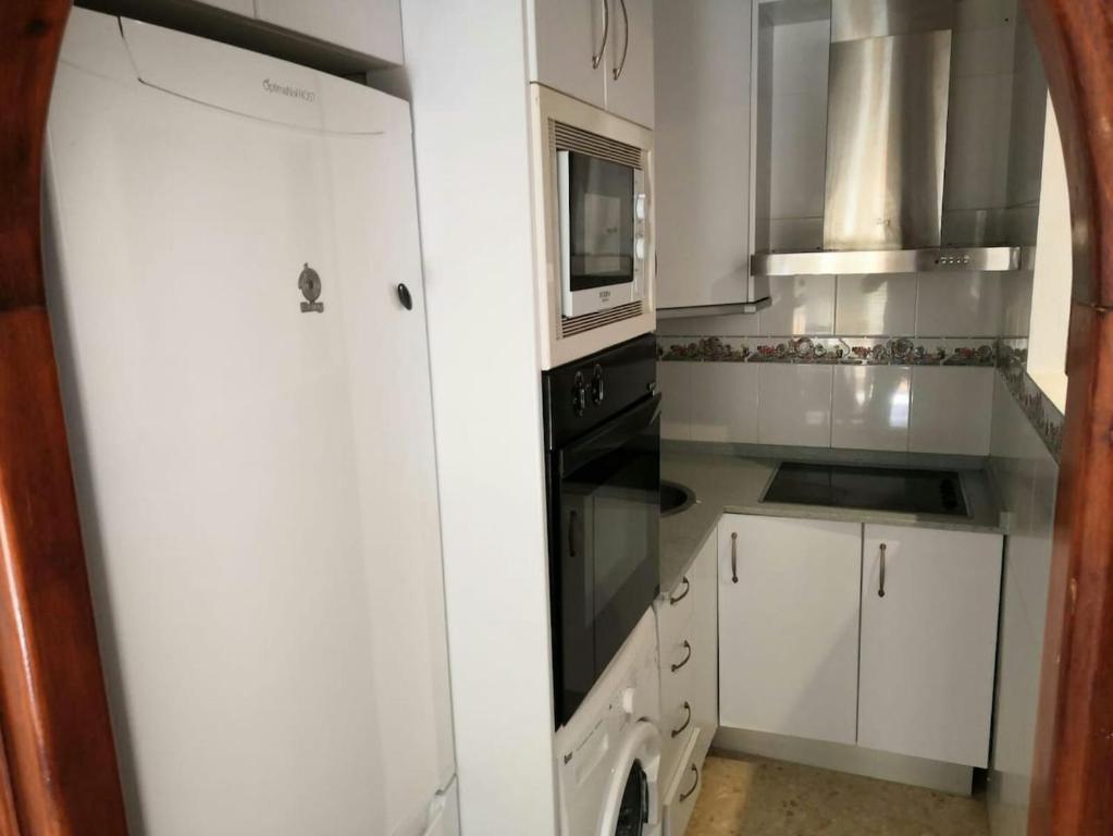Kuchyň nebo kuchyňský kout v ubytování Apartamento Luz
