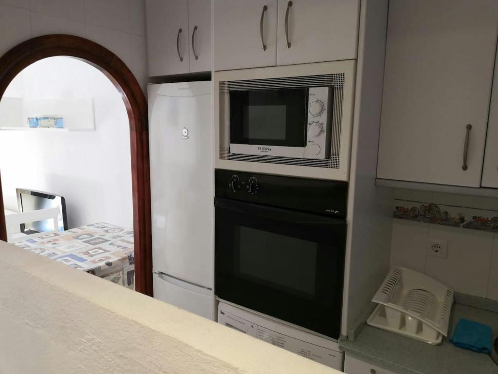 Kuchyň nebo kuchyňský kout v ubytování Apartamento Luz