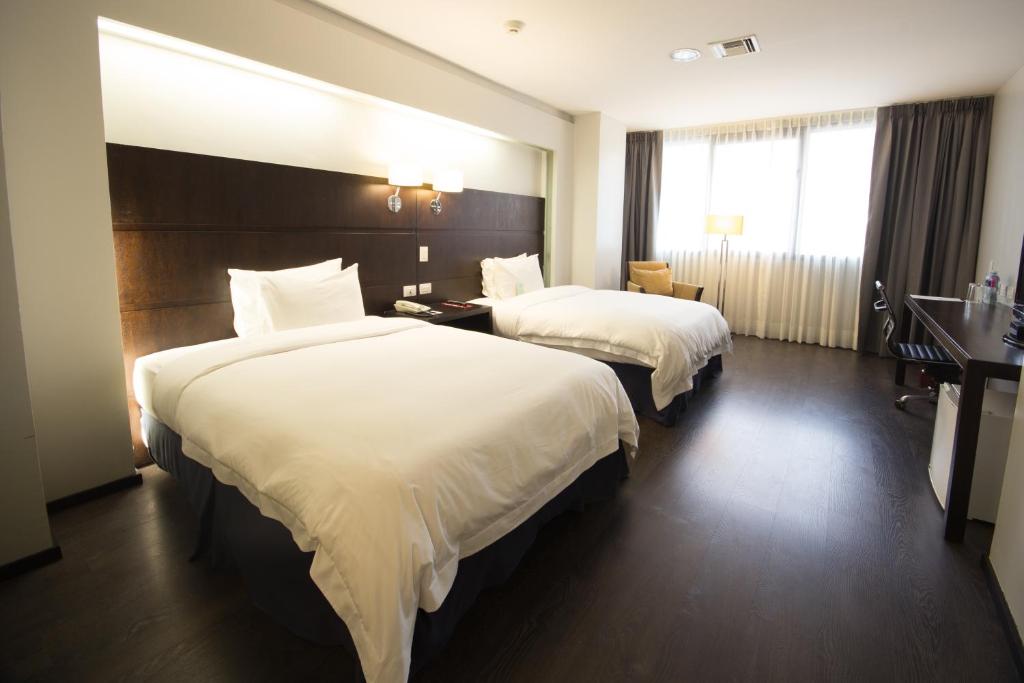 Postel nebo postele na pokoji v ubytování Unipark by Oro Verde Hotels