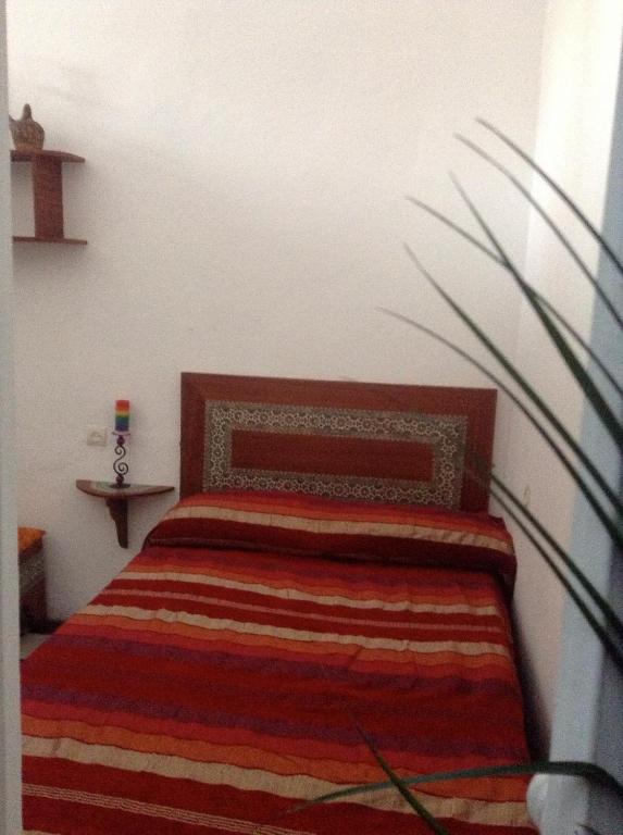 Letto o letti in una camera di Dar Nakhla Naciria
