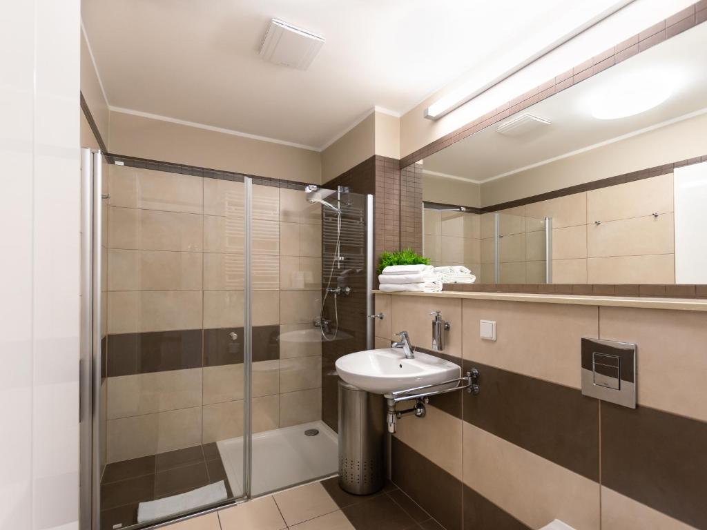 Koupelna v ubytování VacationClub – Olympic Park Apartament B8
