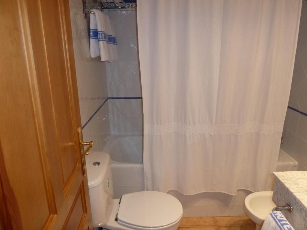 Koupelna v ubytování Apartahotel Faure