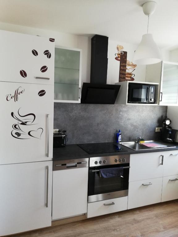 Kuchyň nebo kuchyňský kout v ubytování Ferienwohnung Waldeck am Edersee
