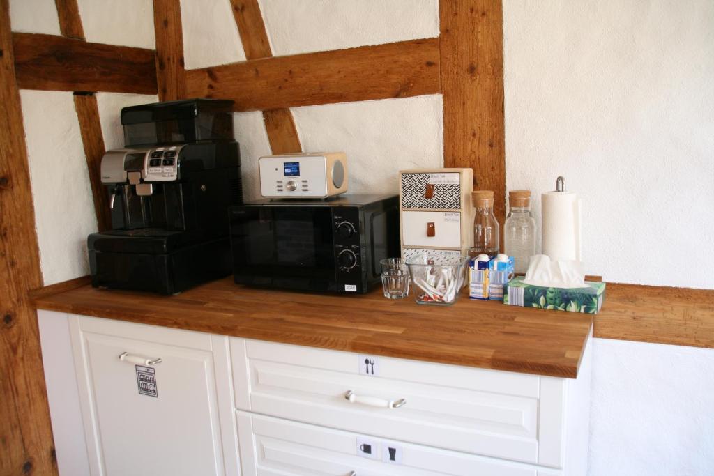 Kuchyň nebo kuchyňský kout v ubytování Waldvogel Ferienzimmer klimatisiert