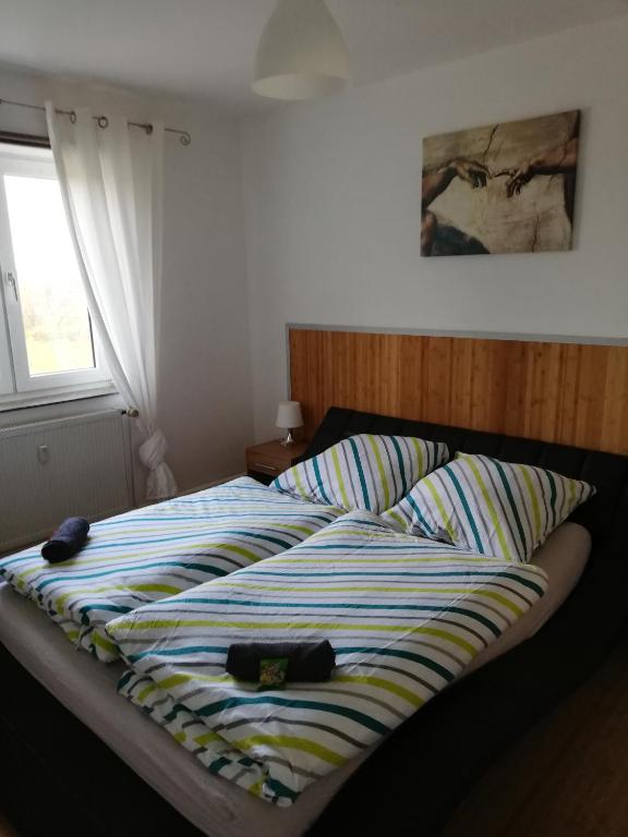 Postel nebo postele na pokoji v ubytování Ferienwohnung Waldeck am Edersee