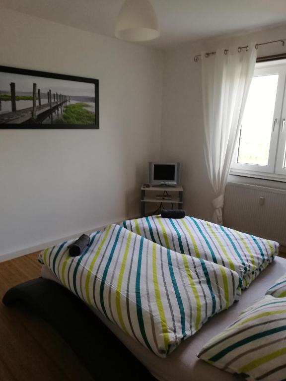 Postel nebo postele na pokoji v ubytování Ferienwohnung Waldeck am Edersee