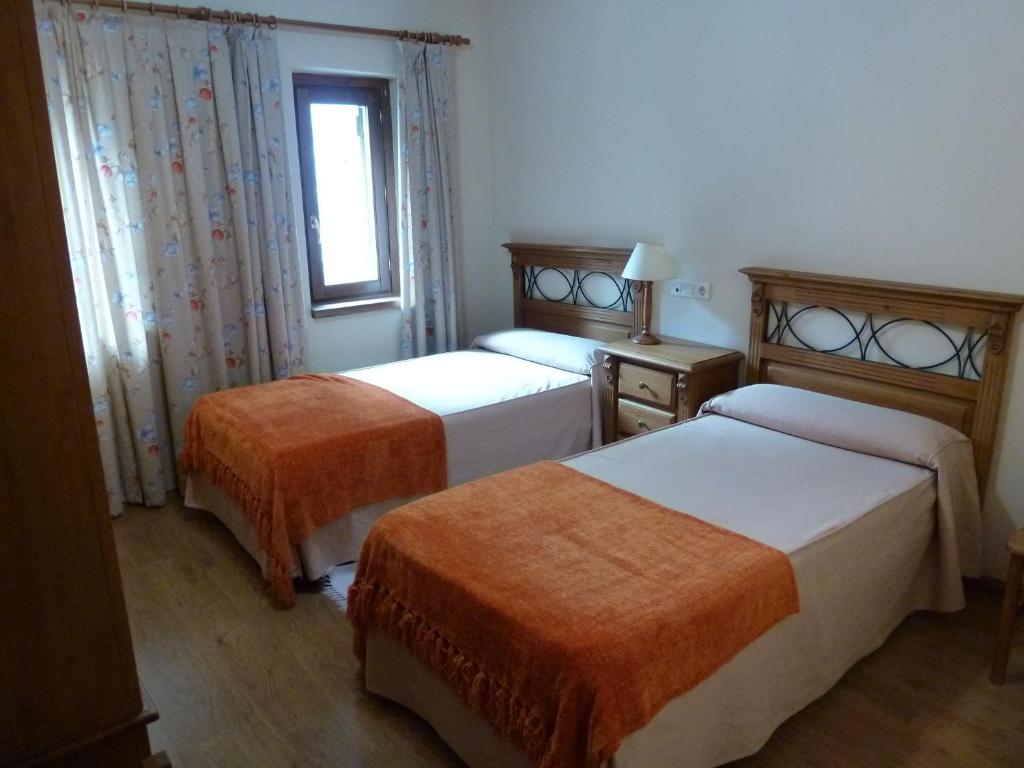 Postel nebo postele na pokoji v ubytování Apartahotel Faure