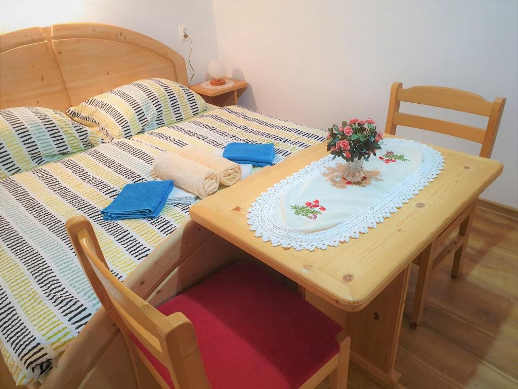 Postel nebo postele na pokoji v ubytování Apartment Sonce